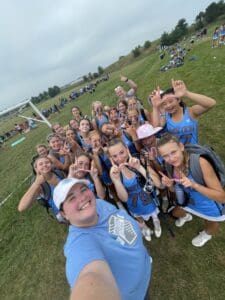 Lacrosse team victory celebration photo.