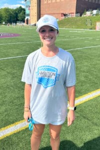 Lacrosse player in Ambition Lacrosse shirt.